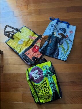 Trader Joe’s tote bags. Reusable. 3 for 1. One is a wine caddy.